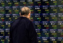 Asian markets on course to end week on positive note
