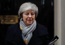 British PM faces defeat in historic Brexit deal vote