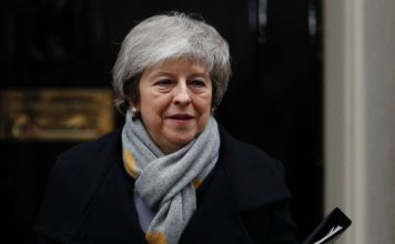 British PM faces defeat in historic Brexit deal vote