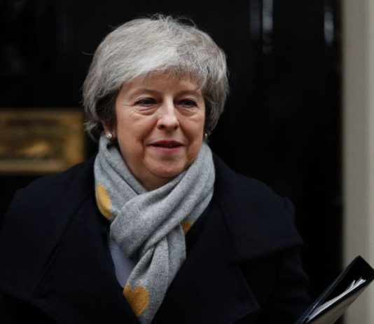 British PM faces defeat in historic Brexit deal vote