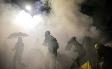Hong Kong faces third day of chaos after night of rage