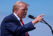 Trump signs order to ban travel to US from 12 nations, partially restricts entry of nationals from 7 nations